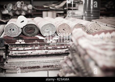 diversity of colour carpets in the store for home decor Stock Photo