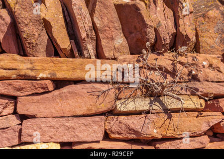Umber rock stone texture. Mediterranean stone wall. Rocks. Stock Photo