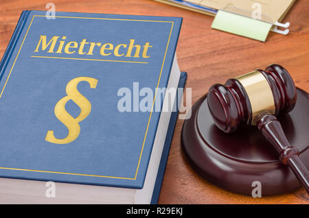 A law book with a gavel - Mietrecht (German word for Tenancy law) Stock Photo