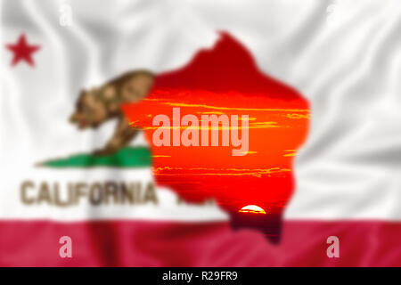 Blurred california Republic Flag with red sunset sky background. concept of fire affecting California in 2018. The most devastating and deadly ever seen in the United States of America. Stock Photo