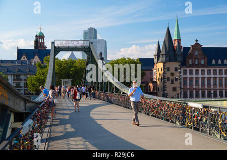 People on Iron Bridge, Frankfurt, Hesse, Germany Stock Photo