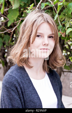 Portrait of cute blond girl fourteen years old Stock Photo