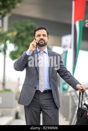 arab businessman  on a phone in Dubai Stock Photo