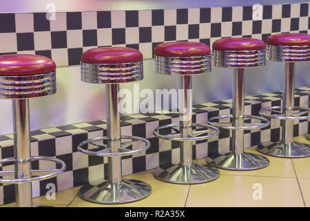 High bar stools in front of the bar Stock Photo