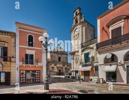 Church of San Benedetto, 18th century, Baroque style, Clock Tower, view from Piazza Giuseppe Garibaldi in Massafra, Apulia, Italy Stock Photo