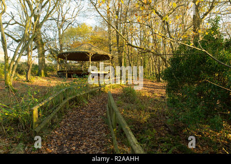 Folly Farm Centre near Bristol, view of woodland classroom from walking route Stock Photo