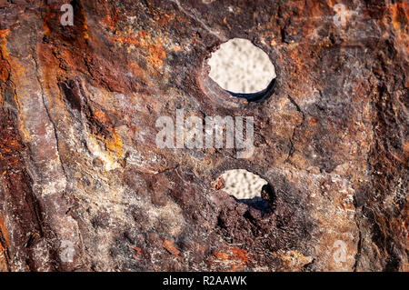 Old rusty metal post Stock Photo