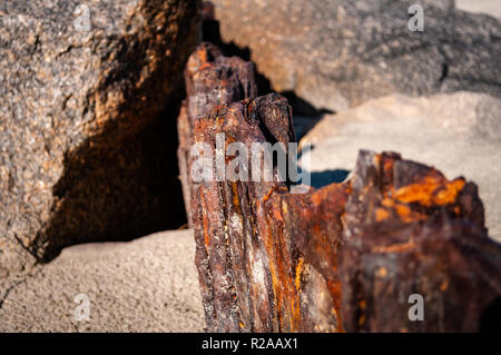 Old rusty metal post Stock Photo