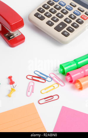 Office Supplies with Calculator Isolated on White Stock Photo
