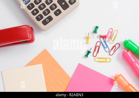 Office Supplies with Calculator Isolated on White Stock Photo