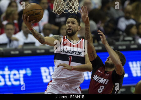 Washington, District of Columbia, USA. 18th Oct, 2018. Washington Wizards guard Austin Rivers (1) shoots a layup while defended by Miami Heat guard Tyler Johnson (8) during the game between the Washington Wizards and Miami Heat at Capitol One Area on October 18, 2018 in Washington, DC. Credit: Alex Edelman/ZUMA Wire/Alamy Live News Stock Photo