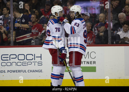 Washington, DC, USA. 17th Oct, 2018. New York Rangers defenseman Brady Skjei (76) talks with New York Rangers center Mika Zibanejad (93) during the game between the New York Rangers and Washington Capitals at Capitol One Arena in Washington, DC on October 17, 2018. Credit: Alex Edelman/ZUMA Wire/Alamy Live News Stock Photo