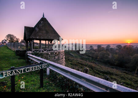 Frant, East Sussex, South East England. Sunset with views to the horizon across the valley over the Bridge Estate, clear sky cold November day Stock Photo