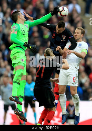 Croatia goalkeeper Lovre Kalinic (left), Antonio Milic (centre) and England's Harry Kane (right) during the UEFA Nations League, Group A4 match at Wembley Stadium, London. Stock Photo