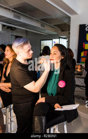 New York City, NY, USA - February 13, 2017 : Women's March Co-Chair and Activist Carmen Perez having makeup done backstage at Fashion Week NYC Stock Photo