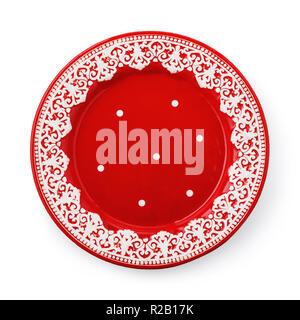 Red ceramic plate with white pattern isolated on white background Stock Photo
