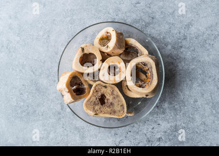 Raw Round Veal Bones for Broth Bouillon in Glass Bowl. Organic Product. Stock Photo