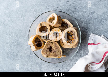 Raw Round Veal Bones for Broth Bouillon in Glass Bowl. Organic Product. Stock Photo