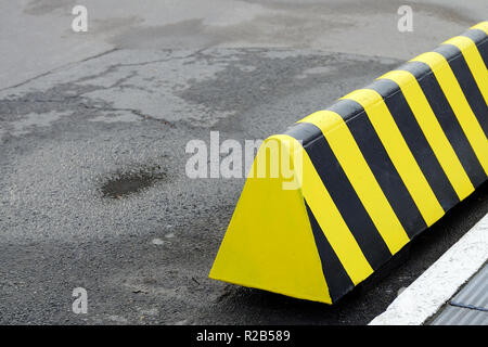 traffic limiters in the Parking lot. Modern barrier fence for cars in ...