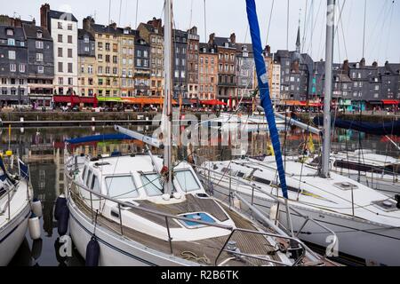 HONFLEUR, FRANCE - APRIL 8, 2018: view of the bay and the embankment  in the famous French city Honfleur. Normandy, France Stock Photo