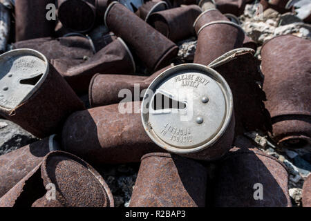 Rusted cans disposed in the nature Stock Photo