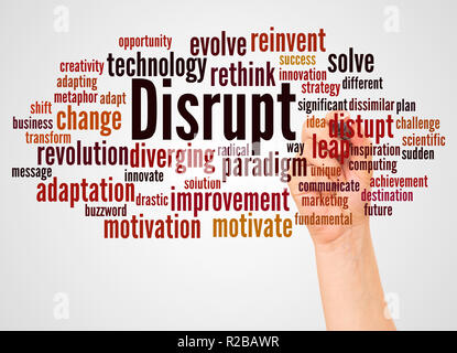 Disrupt word cloud and hand with marker concept on white background. Stock Photo