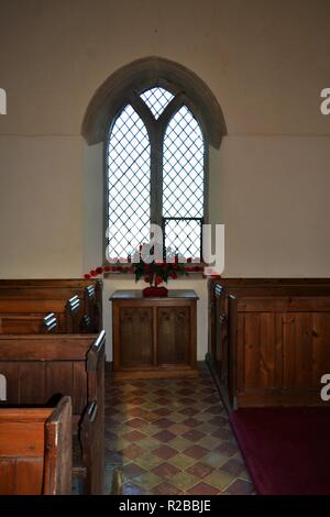 Barnham Suffolk country village in November on 100 anniversary of the end of first world war church decorated with hand made poppies Stock Photo