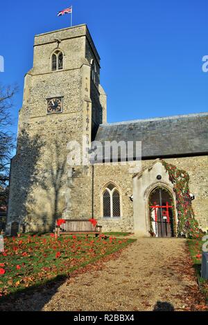 Barnham Suffolk country village in November on 100 anniversary of the end of first world war church decorated with hand made poppies Stock Photo