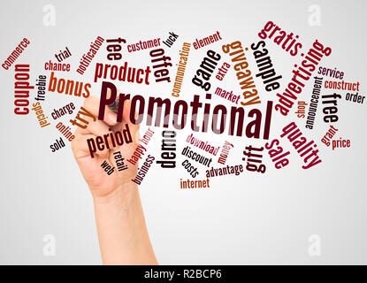 Promotional word cloud and hand with marker concept on white background. Stock Photo