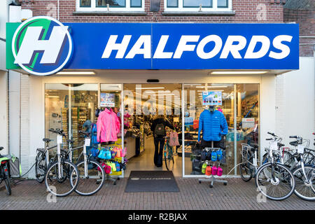 Halfords store in Sneek, the Netherlands. Halfords Nederland B.V. owns and operates a chain of bike and car part stores in Netherlands and Belgium. Stock Photo