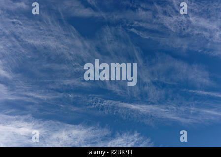 Cirrus clouds in blue sky over North west England uk Stock Photo