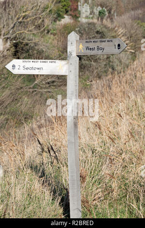 Signpost on the south west coast path at Eype, Dorset, UK Stock Photo