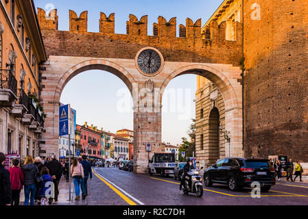 The Portoni della Bra at sunset. The Portoni della Bra is a Verona gate built along the medieval walls to connect the Piazza Bra to the countryside. V Stock Photo