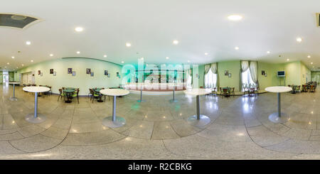 360 degree panoramic view of MINSK, BELARUS - JULY, 2016: full seamless spherical panorama 360 degrees angle Inside interior of small cafe bar. 360 panorama in equirectangular pro