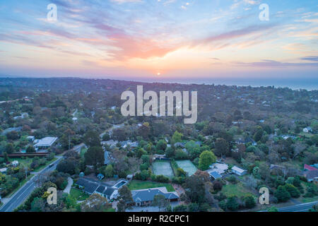 Rural area near the ocean at sunset - aerial view Stock Photo