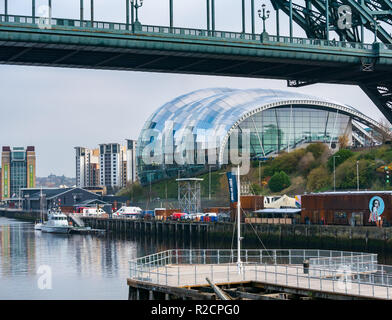 View under Tyne Bridge of Sage Gateshead culture centre building, Rver Tyne, Newcastle Upon Tyne, England, UK Stock Photo
