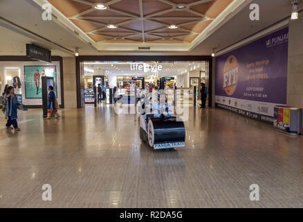 Mohali, Punjab, India. 19th Nov, 2018. People seen walking in a shopping mall in Mohali, India. Mohali is a city in the Sahibzada Ajit Singh Nagar district in Punjab, India, which is a commercial hub lying south-west to the Union Territory of Chandigarh. Mohali has emerged as one of the most important cities in Punjab and the rest of northern India; it is developing rapidly as an IT Hub of the state. Credit: Saqib Majeed/SOPA Images/ZUMA Wire/Alamy Live News Stock Photo