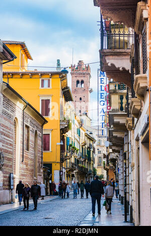 Narrow and colorful street of the historic center. Verona, Veneto, Italy, Europe Stock Photo