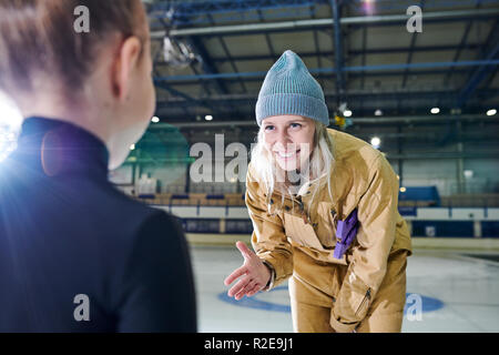 Happy Mother of Talented Girl Stock Photo