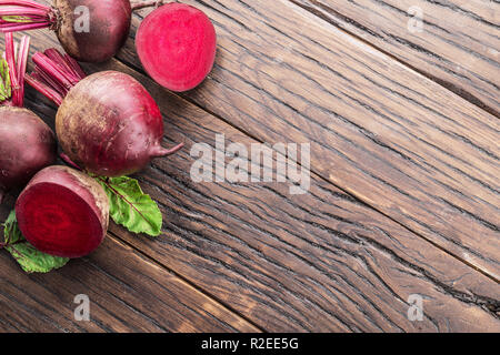 Red beets or beetroots on the wooden table. Stock Photo