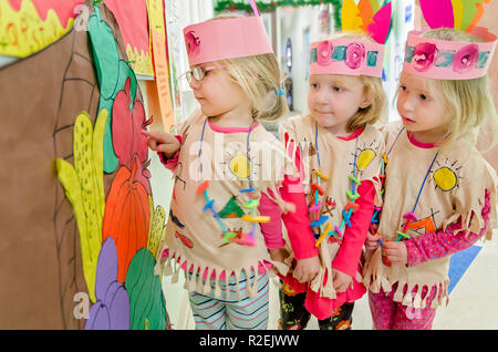 Pre-school students are dressed for Thanksgiving in Native American Indian costumes, Nov. 21, 2012, in Columbus, Mississippi. Stock Photo