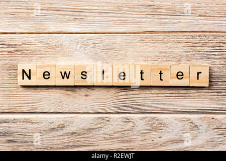 newsletter word written on wood block. newsletter text on table, concept. Stock Photo