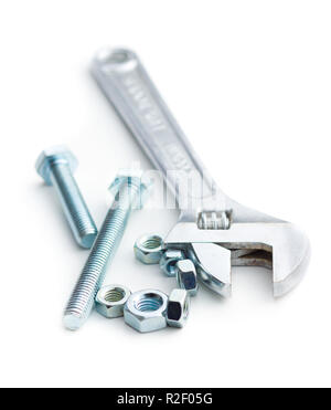 Chrome vanadium wrench and bolts. Industrial spanner isolated on white background. Stock Photo