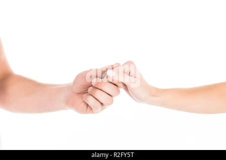 Partial view of people tenderly holding hands isolated on white Stock Photo