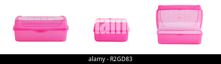 Pink lunch boxes on a white background, in different settings. Stock Photo