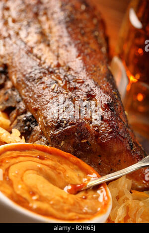 Rosted ribs with spices on wooden board Stock Photo