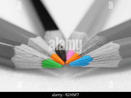 Seven  pencils with colored pins closeup with blur Stock Photo