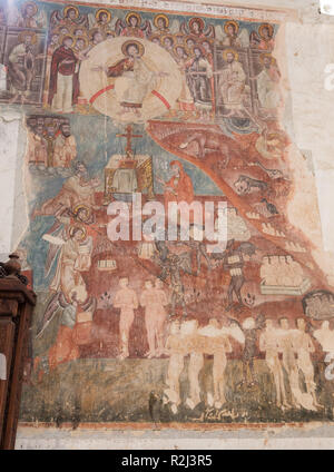 ANANURI, GEORGIA - SEPTEMBER 24, 2018: old fresco on wall of Assumption Church depicts scene of the Last Judgment Stock Photo