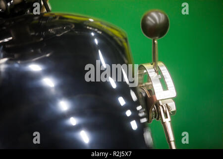 Vintage motorcycle hand gear shifter also called suicide shifter. Stock Photo