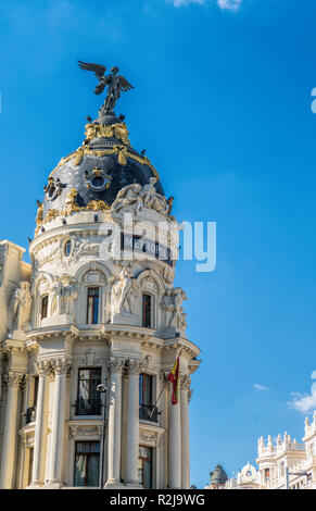 Metropolis Building  is one of the most famous Beaux-Arts style landmark of City of Madrid. It located at the corner of the Calle de Alcala and Gran V Stock Photo